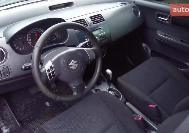 Черный Сузуки Свифт, объемом двигателя 1.49 л и пробегом 146 тыс. км за 5000 $, фото 15 на Automoto.ua