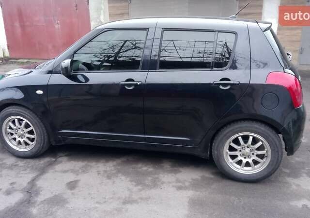 Черный Сузуки Свифт, объемом двигателя 1.49 л и пробегом 146 тыс. км за 5000 $, фото 1 на Automoto.ua