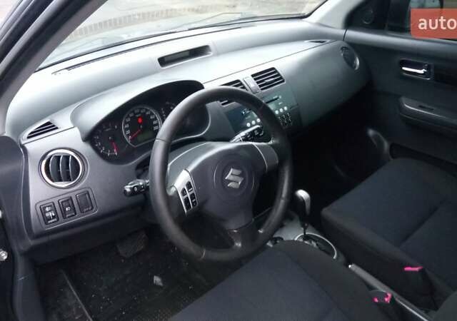 Черный Сузуки Свифт, объемом двигателя 1.49 л и пробегом 146 тыс. км за 5000 $, фото 24 на Automoto.ua