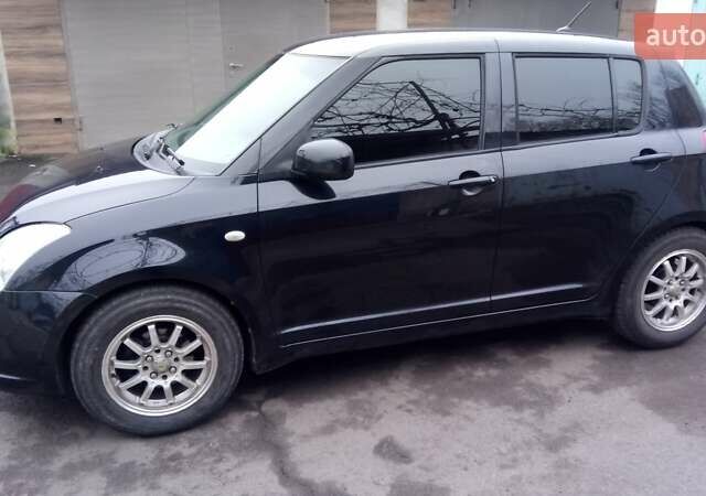 Черный Сузуки Свифт, объемом двигателя 1.49 л и пробегом 146 тыс. км за 5000 $, фото 3 на Automoto.ua