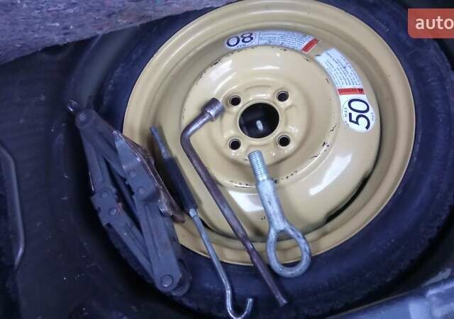 Черный Сузуки Свифт, объемом двигателя 1.49 л и пробегом 146 тыс. км за 5000 $, фото 22 на Automoto.ua