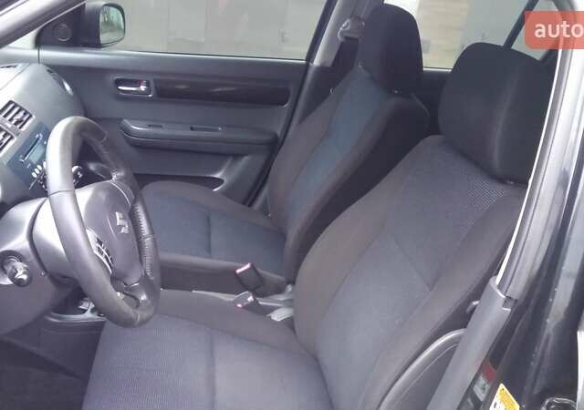 Черный Сузуки Свифт, объемом двигателя 1.49 л и пробегом 146 тыс. км за 5000 $, фото 12 на Automoto.ua