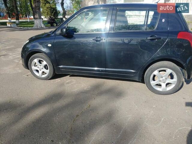 Чорний Сузукі Свифт, об'ємом двигуна 1.3 л та пробігом 152 тис. км за 5500 $, фото 29 на Automoto.ua