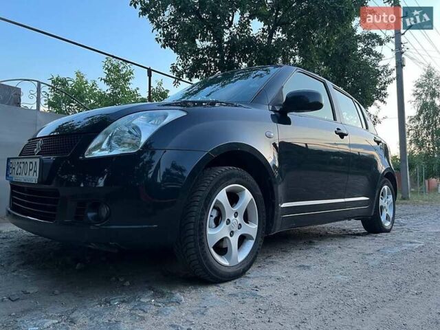 Чорний Сузукі Свифт, об'ємом двигуна 1.3 л та пробігом 152 тис. км за 5500 $, фото 5 на Automoto.ua