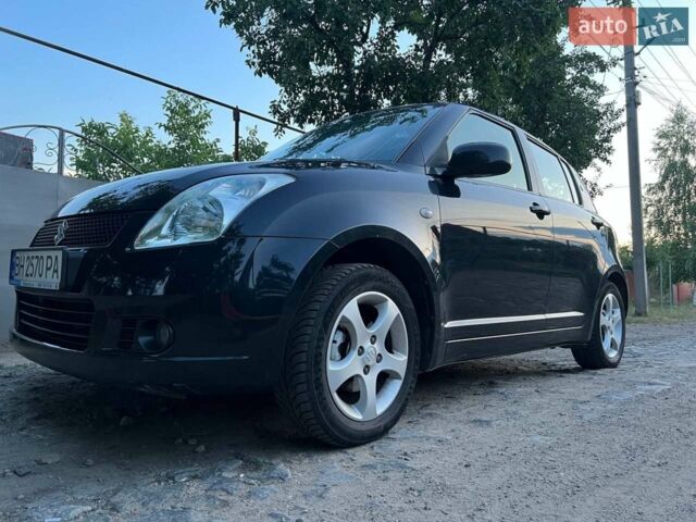 Чорний Сузукі Свифт, об'ємом двигуна 1.3 л та пробігом 152 тис. км за 5500 $, фото 5 на Automoto.ua