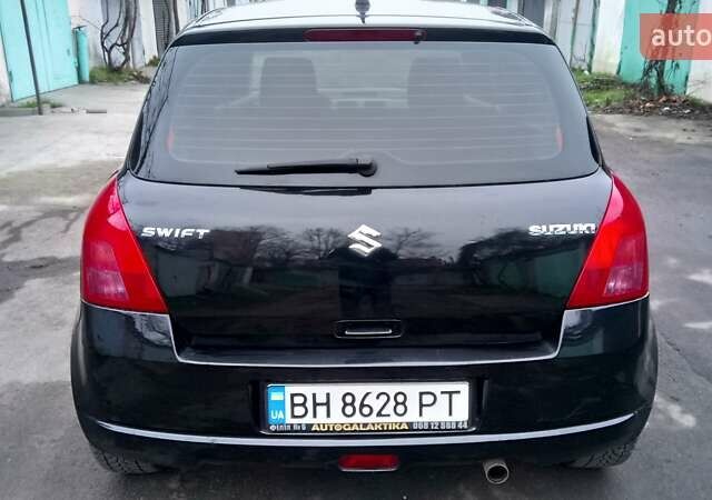 Черный Сузуки Свифт, объемом двигателя 1.49 л и пробегом 146 тыс. км за 5000 $, фото 8 на Automoto.ua