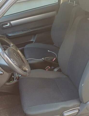 Чорний Сузукі Свифт, об'ємом двигуна 1.33 л та пробігом 164 тис. км за 3900 $, фото 6 на Automoto.ua