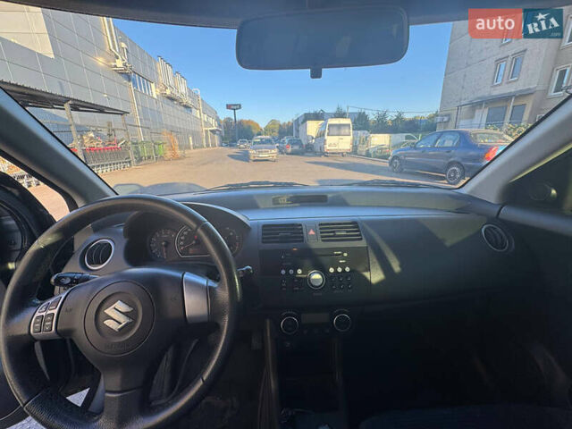 Черный Сузуки Свифт, объемом двигателя 1.33 л и пробегом 85 тыс. км за 6000 $, фото 14 на Automoto.ua