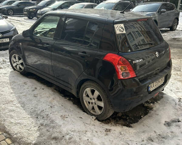 Чорний Сузукі Свифт, об'ємом двигуна 1.49 л та пробігом 99 тис. км за 6900 $, фото 1 на Automoto.ua