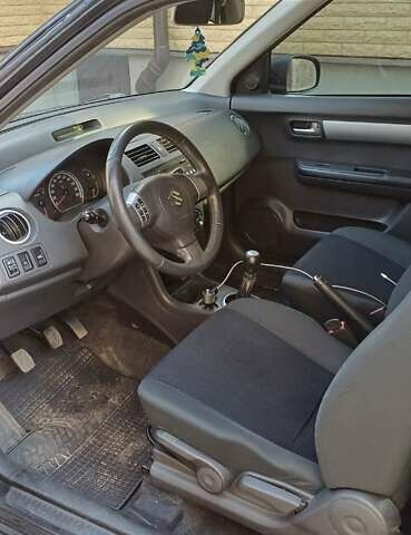 Чорний Сузукі Свифт, об'ємом двигуна 1.33 л та пробігом 164 тис. км за 3900 $, фото 9 на Automoto.ua