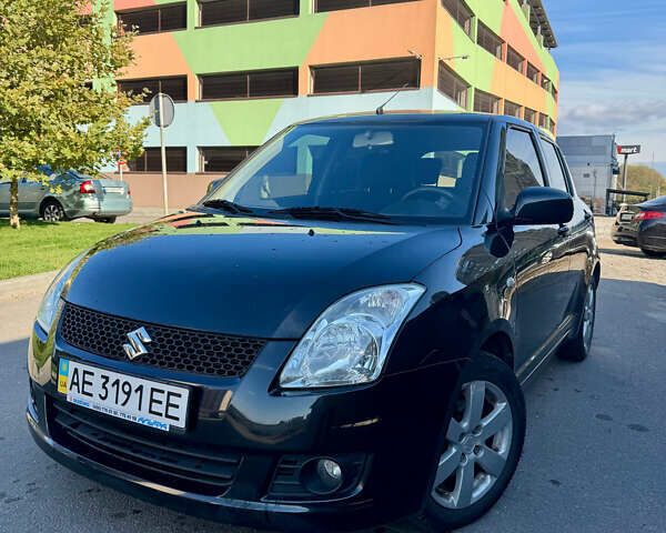 Черный Сузуки Свифт, объемом двигателя 1.33 л и пробегом 85 тыс. км за 6000 $, фото 1 на Automoto.ua