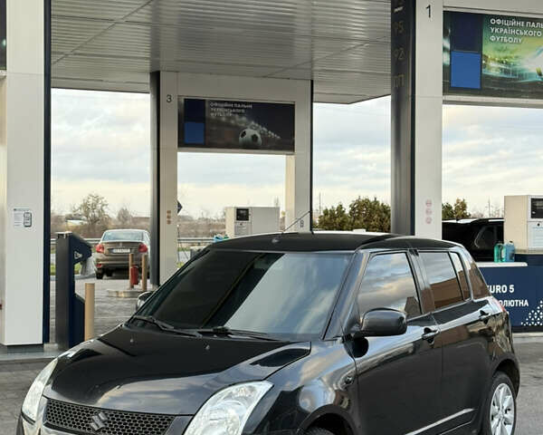 Чорний Сузукі Свифт, об'ємом двигуна 1.33 л та пробігом 199 тис. км за 4799 $, фото 4 на Automoto.ua