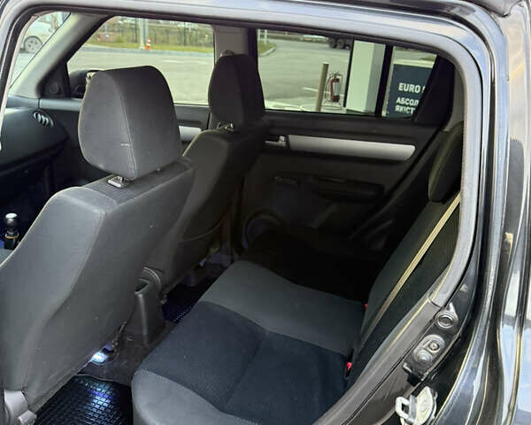 Чорний Сузукі Свифт, об'ємом двигуна 1.33 л та пробігом 199 тис. км за 4799 $, фото 22 на Automoto.ua