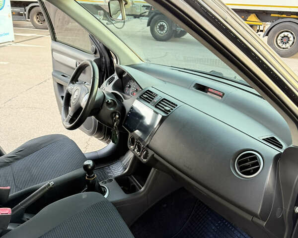 Чорний Сузукі Свифт, об'ємом двигуна 1.33 л та пробігом 199 тис. км за 4799 $, фото 17 на Automoto.ua