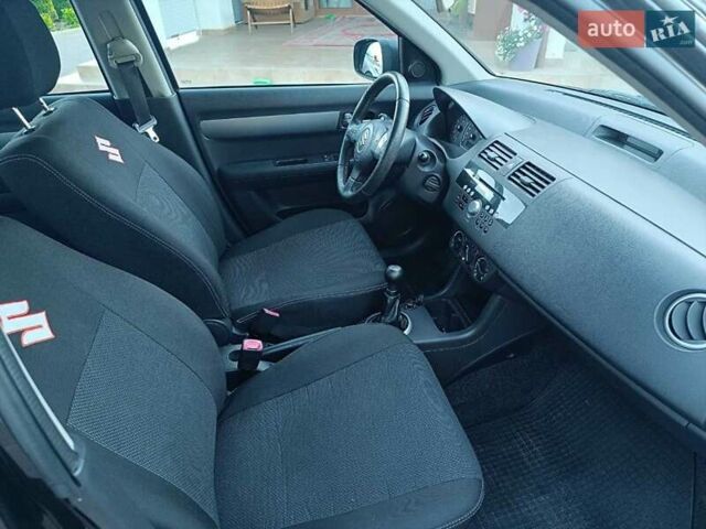 Черный Сузуки Свифт, объемом двигателя 0 л и пробегом 112 тыс. км за 5704 $, фото 13 на Automoto.ua