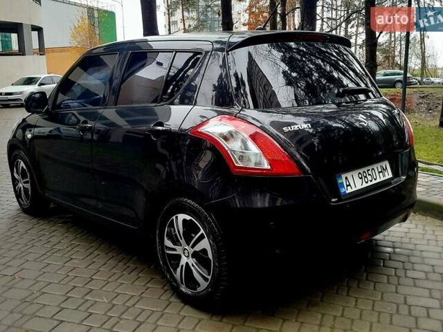 Чорний Сузукі Свифт, об'ємом двигуна 1.24 л та пробігом 126 тис. км за 8300 $, фото 10 на Automoto.ua