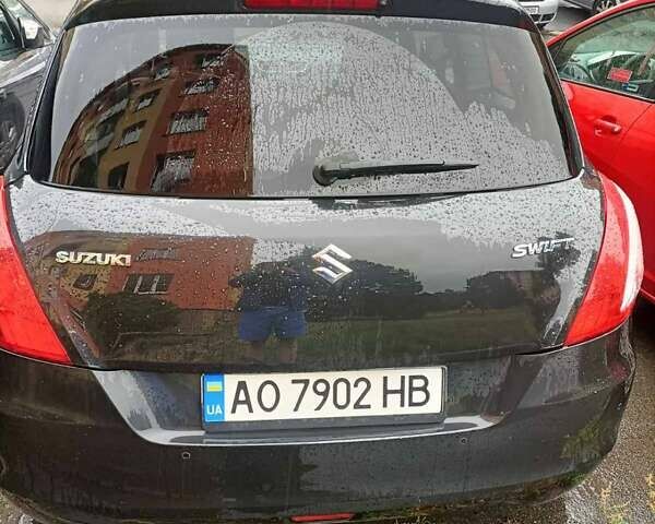 Черный Сузуки Свифт, объемом двигателя 1.2 л и пробегом 195 тыс. км за 5700 $, фото 1 на Automoto.ua