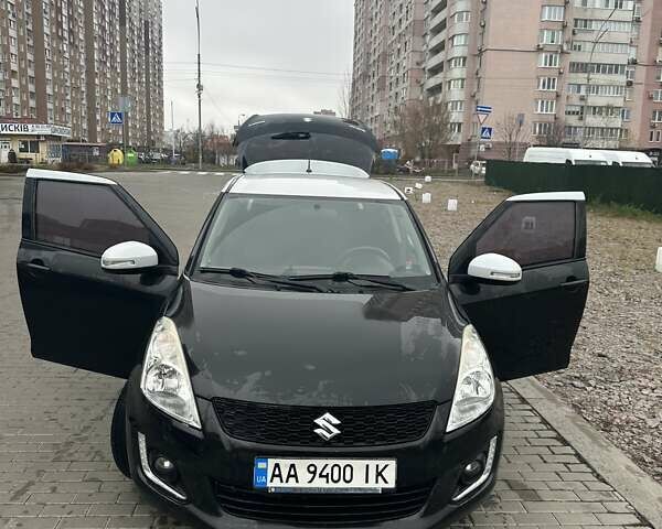 Черный Сузуки Свифт, объемом двигателя 1.24 л и пробегом 103 тыс. км за 10200 $, фото 1 на Automoto.ua