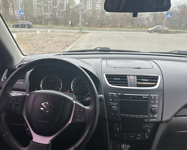 Черный Сузуки Свифт, объемом двигателя 1.24 л и пробегом 103 тыс. км за 10200 $, фото 9 на Automoto.ua