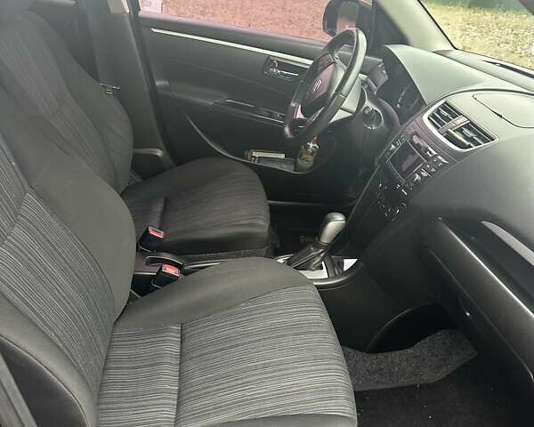 Черный Сузуки Свифт, объемом двигателя 1.24 л и пробегом 103 тыс. км за 10200 $, фото 13 на Automoto.ua