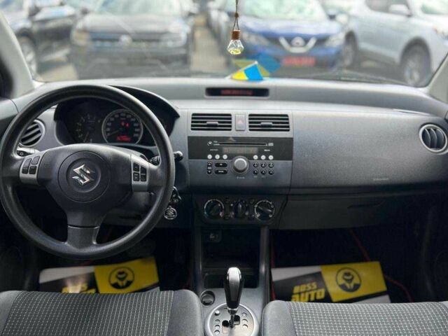 Красный Сузуки Свифт, объемом двигателя 1.3 л и пробегом 178 тыс. км за 5500 $, фото 13 на Automoto.ua