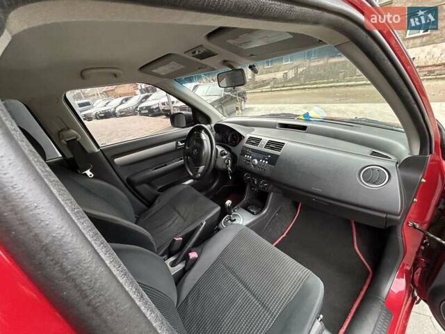 Красный Сузуки Свифт, объемом двигателя 1.33 л и пробегом 178 тыс. км за 3999 $, фото 18 на Automoto.ua