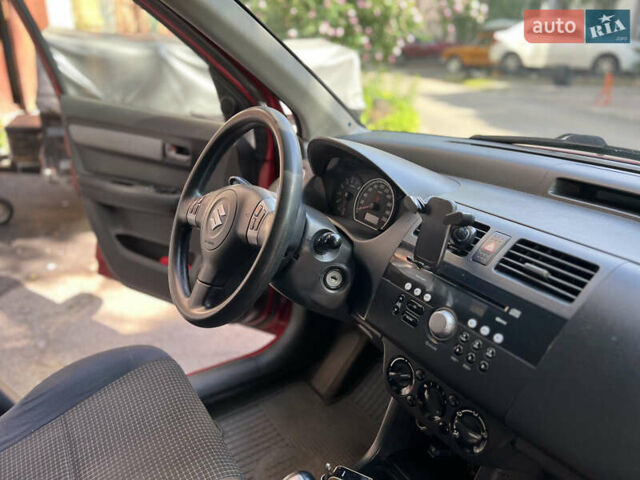 Червоний Сузукі Свифт, об'ємом двигуна 1.33 л та пробігом 188 тис. км за 4800 $, фото 6 на Automoto.ua