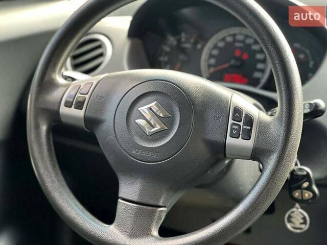 Красный Сузуки Свифт, объемом двигателя 1.33 л и пробегом 178 тыс. км за 5500 $, фото 11 на Automoto.ua