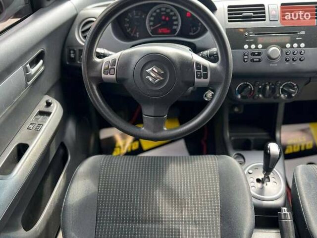 Красный Сузуки Свифт, объемом двигателя 1.33 л и пробегом 178 тыс. км за 5500 $, фото 12 на Automoto.ua