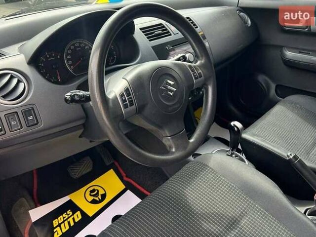 Красный Сузуки Свифт, объемом двигателя 1.33 л и пробегом 178 тыс. км за 5500 $, фото 7 на Automoto.ua