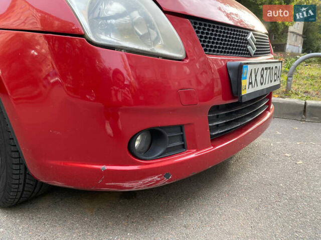 Червоний Сузукі Свифт, об'ємом двигуна 1.49 л та пробігом 146 тис. км за 4500 $, фото 13 на Automoto.ua