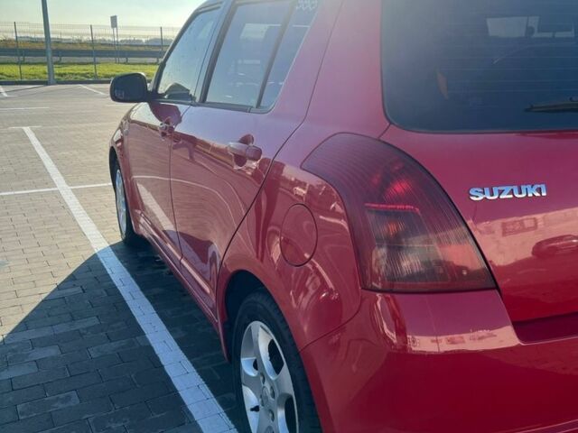 Червоний Сузукі Свифт, об'ємом двигуна 1.3 л та пробігом 130 тис. км за 4900 $, фото 2 на Automoto.ua