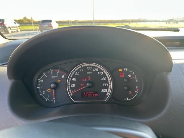 Червоний Сузукі Свифт, об'ємом двигуна 1.3 л та пробігом 130 тис. км за 4900 $, фото 6 на Automoto.ua