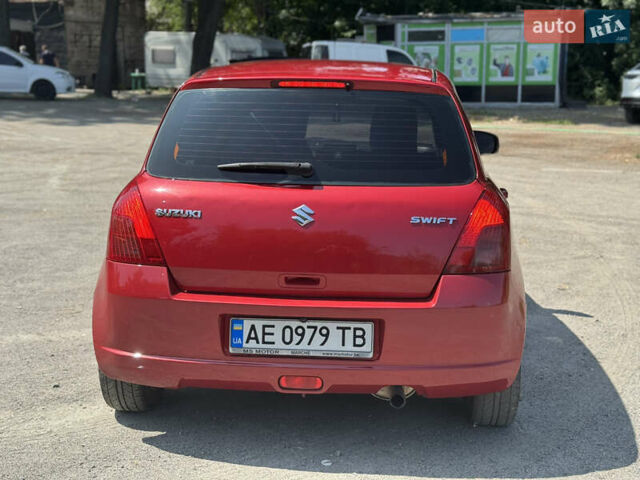 Красный Сузуки Свифт, объемом двигателя 1.25 л и пробегом 205 тыс. км за 5700 $, фото 8 на Automoto.ua