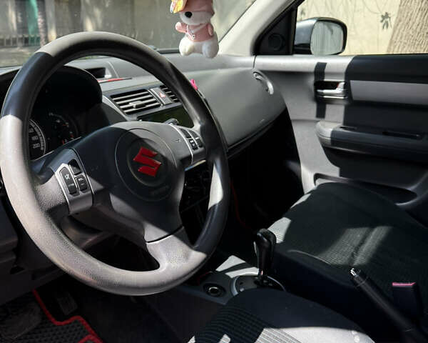 Красный Сузуки Свифт, объемом двигателя 1.33 л и пробегом 163 тыс. км за 4600 $, фото 6 на Automoto.ua