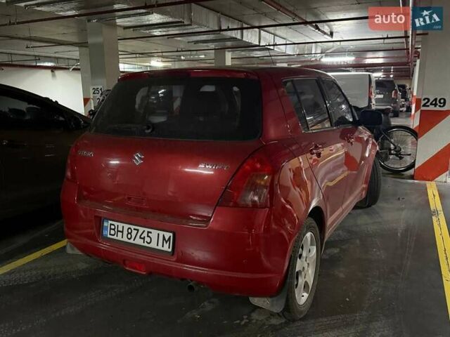 Красный Сузуки Свифт, объемом двигателя 1.33 л и пробегом 147 тыс. км за 4200 $, фото 2 на Automoto.ua