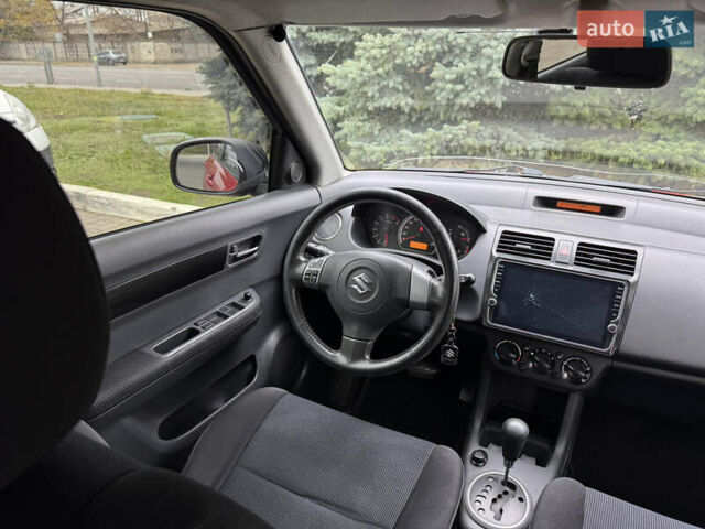 Красный Сузуки Свифт, объемом двигателя 1.49 л и пробегом 160 тыс. км за 5300 $, фото 29 на Automoto.ua