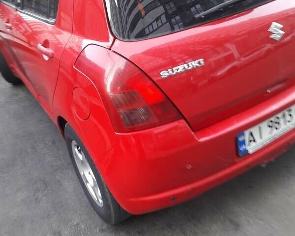 Червоний Сузукі Свифт, об'ємом двигуна 1.33 л та пробігом 220 тис. км за 6800 $, фото 14 на Automoto.ua
