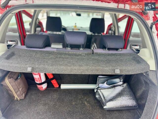 Червоний Сузукі Свифт, об'ємом двигуна 1.49 л та пробігом 174 тис. км за 5500 $, фото 15 на Automoto.ua