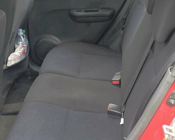 Красный Сузуки Свифт, объемом двигателя 1.49 л и пробегом 306 тыс. км за 6500 $, фото 4 на Automoto.ua