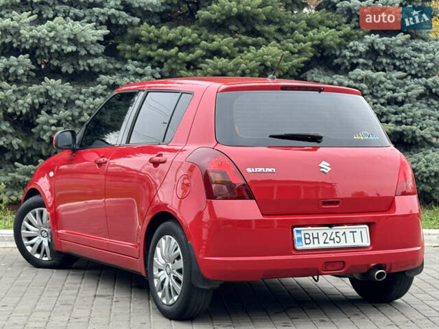 Червоний Сузукі Свифт, об'ємом двигуна 1.49 л та пробігом 160 тис. км за 5300 $, фото 11 на Automoto.ua