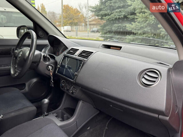 Червоний Сузукі Свифт, об'ємом двигуна 1.49 л та пробігом 160 тис. км за 5300 $, фото 38 на Automoto.ua