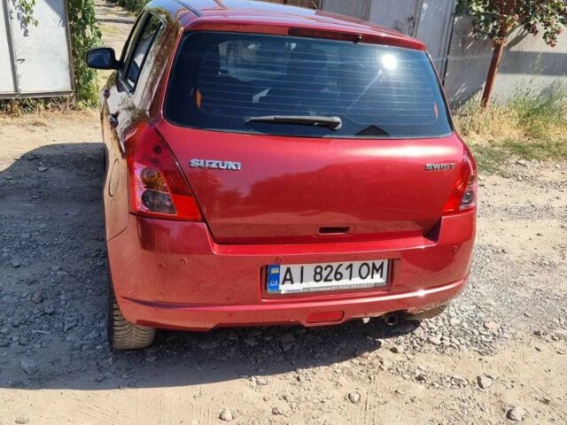 Червоний Сузукі Свифт, об'ємом двигуна 1.3 л та пробігом 166 тис. км за 4399 $, фото 12 на Automoto.ua
