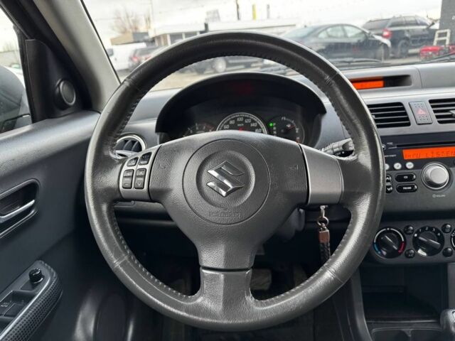 Червоний Сузукі Свифт, об'ємом двигуна 1.5 л та пробігом 148 тис. км за 5700 $, фото 9 на Automoto.ua