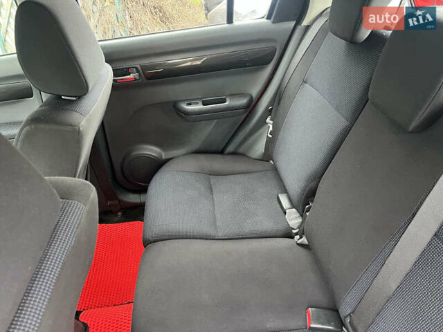 Червоний Сузукі Свифт, об'ємом двигуна 1.5 л та пробігом 160 тис. км за 5600 $, фото 7 на Automoto.ua