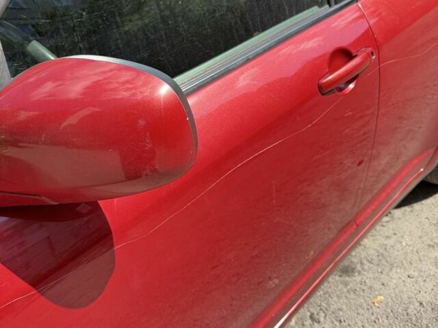 Красный Сузуки Свифт, объемом двигателя 1.5 л и пробегом 255 тыс. км за 5600 $, фото 1 на Automoto.ua