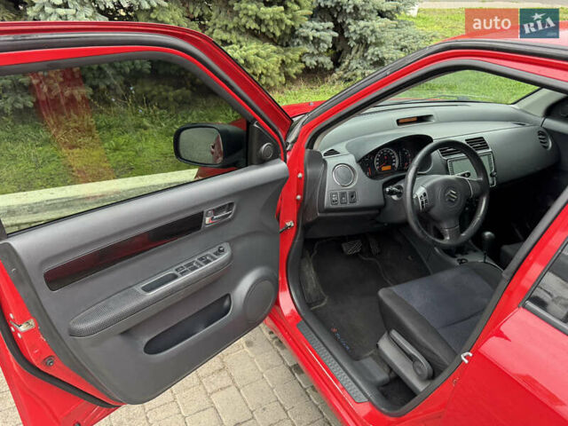 Червоний Сузукі Свифт, об'ємом двигуна 1.49 л та пробігом 160 тис. км за 5300 $, фото 18 на Automoto.ua