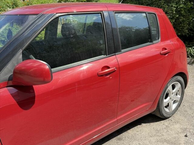 Красный Сузуки Свифт, объемом двигателя 1.5 л и пробегом 255 тыс. км за 5600 $, фото 10 на Automoto.ua