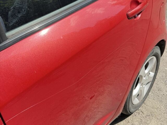 Красный Сузуки Свифт, объемом двигателя 1.5 л и пробегом 255 тыс. км за 5600 $, фото 2 на Automoto.ua