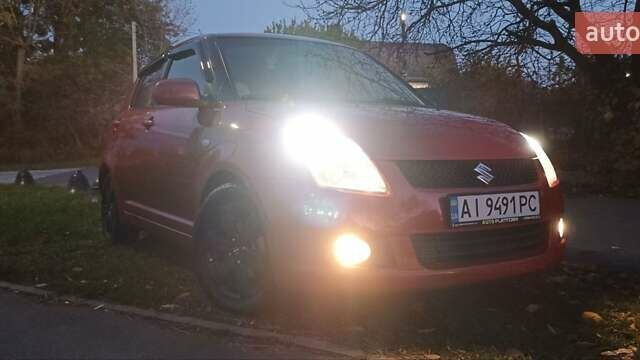 Сузукі Свифт 2007 у Боярка на Automoto.ua Червоний Сузукі Свифт, об'ємом двигуна 1.49 л та пробігом 213 тис. км за 6500 $, фото 20 на Automoto.ua